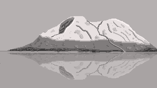 a mountain reflected in a lake in grey scale